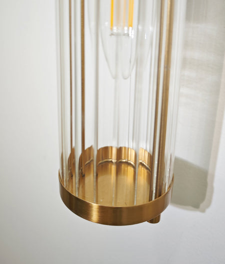 Tiempo Interior Up/Down Tubular Clear Glass Wall Light - Antique Brass