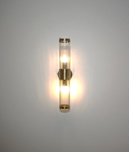 Tiempo Interior Up/Down Tubular Clear Glass Wall Light - Antique Brass
